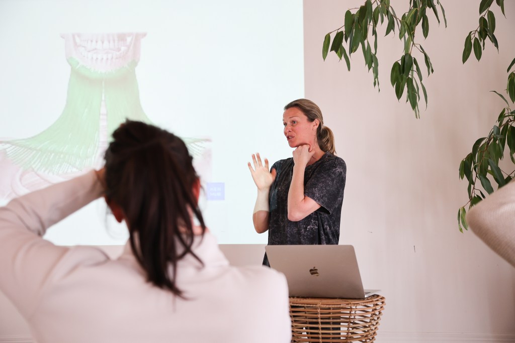 The Osteo facialist teaching self massage Philppa Pownall at Kula Retreat
