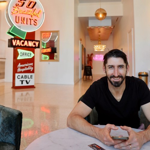 Stu Reed practising his poker face at the Graduate Hotel Nashville, the same discipline a voice of customer programme needs | Good CX