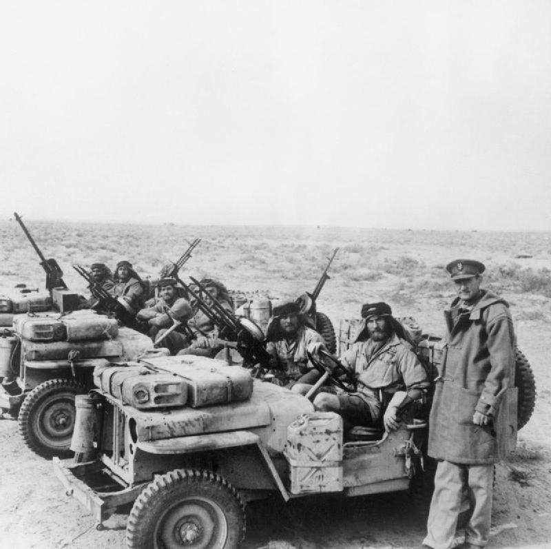 Colonel David Stirling, founder of the SAS, with an SAS jeep patrol in North Africa, 18 January 1943. Imperial War Museum E21338.