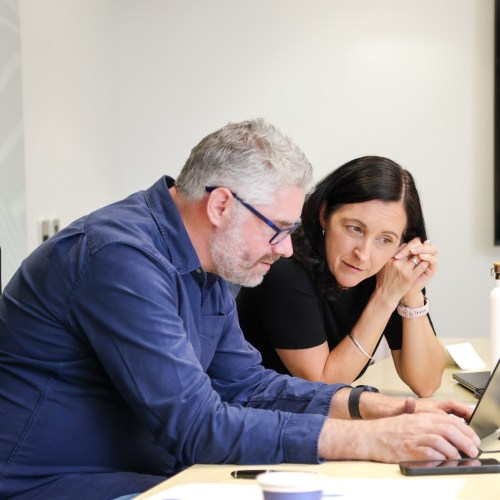 Craig Manning, measurement and modelling specialist, reviewing analytics with the Good CX team